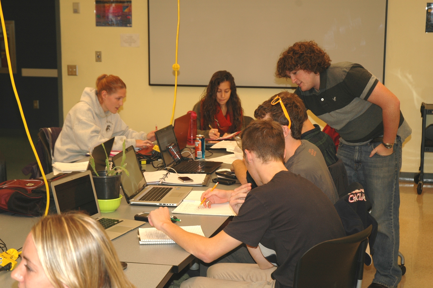 tutor with students in the PLC