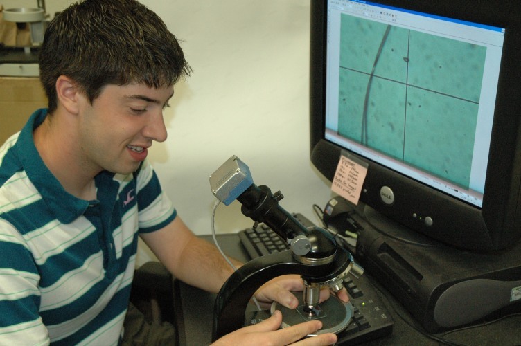 brandon using microscope